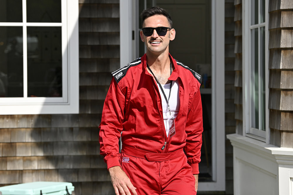 Carl Radke dressed like a race car driver while filming Summer House.
